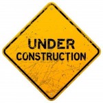 14383930-dirty-under-construction-sign